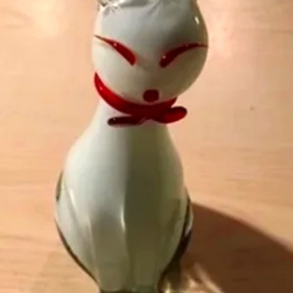 Vintage murano glass cat 6 inch with red eyes and filled with sand blown glass